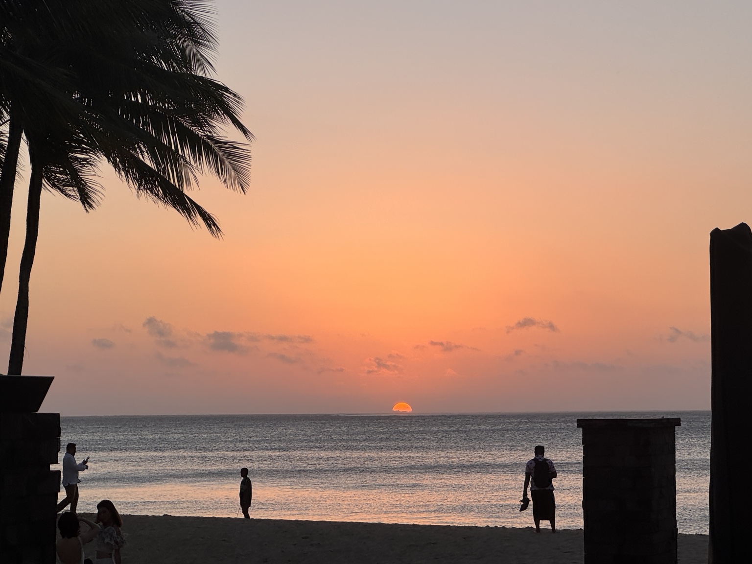 The last of the sun over the beach at Natadola.